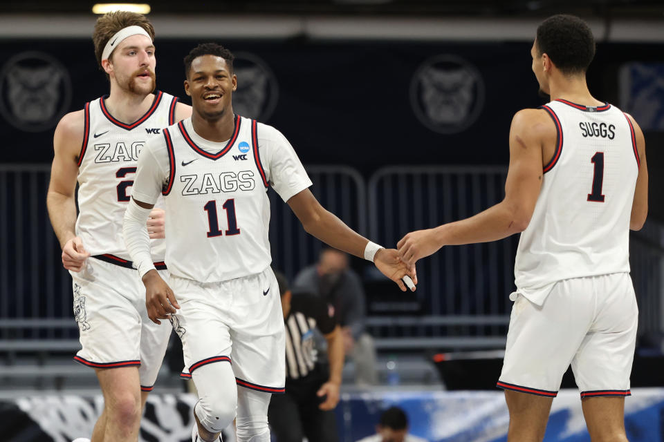 INDIANAPOLIS, IN - MARCH 28: Joel Ayayi #11 of the Gonzaga Bulldogs and teammate Jalen Suggs #1 celebrate in the Sweet Sixteen round of the 2021 NCAA Division I Mens Basketball Tournament held at Hinkle Fieldhouse on March 28, 2021 in Indianapolis, Indiana. (Photo by Trevor Brown Jr/NCAA Photos via Getty Images)