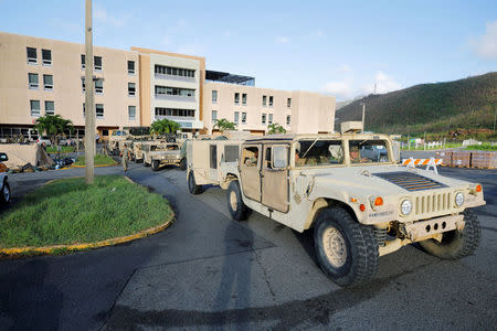 Soldiers from the 602nd Area Support Medical Company evacuate their unit from Schneider Regional Medical Center in advance of Hurricane Maria, in Charlotte Amalie, St. Thomas, U.S. Virgin Islands September 17, 2017. REUTERS/Jonathan Drake