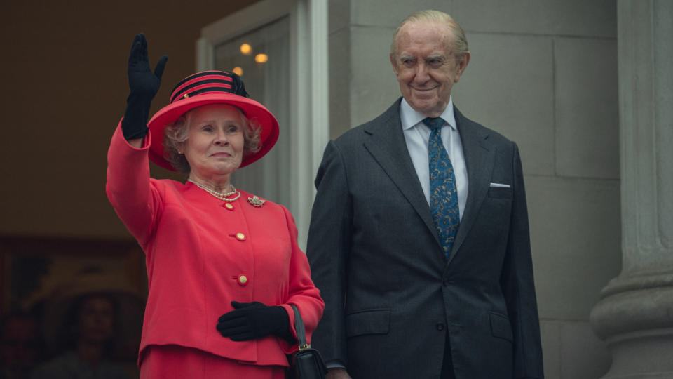 Imelda Staunton waves while Jonathan Pryce watches in The Crown Season 6 Part 2.