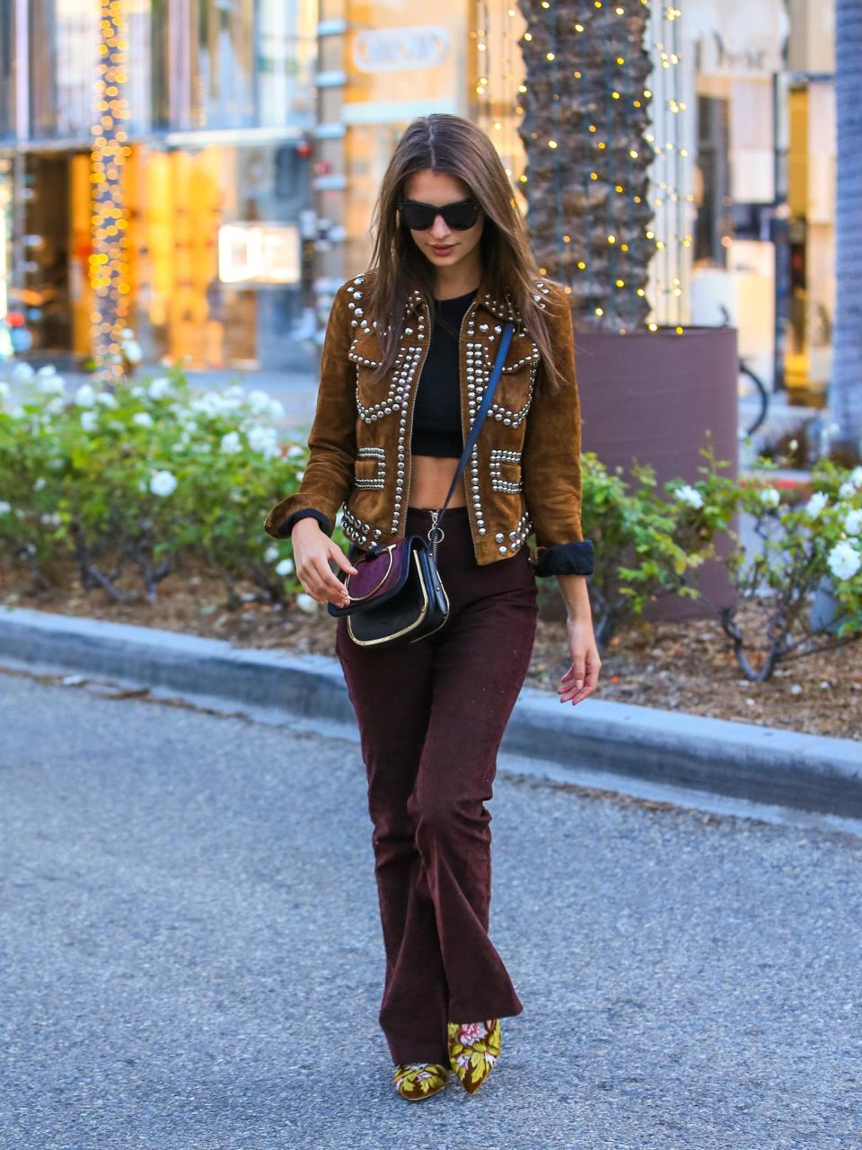 Emily Ratajkowski steps out in Beverly Hills wearing a chic western inspired look.