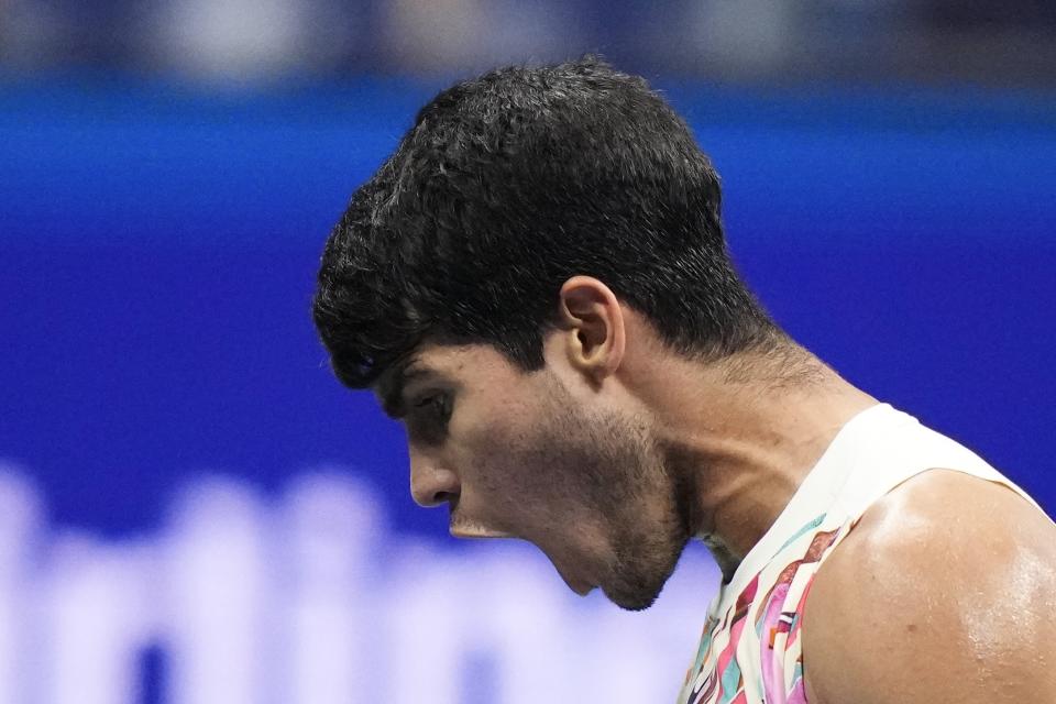 Carlos Alcaraz, of Spain, reacts against Alexander Zverev, of Germany, during the quarterfinals of the U.S. Open tennis championships, Wednesday, Sept. 6, 2023, in New York. (AP Photo/Frank Franklin II)