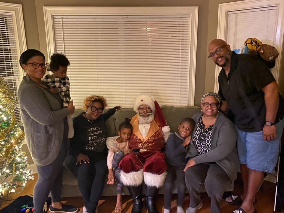 Santa Andre Parker, a professional Black Santa, visited the Richardson family in their Stone Mountain, Georgia, home during the 2022 holiday season.