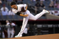 Arizona Diamondbacks starting pitcher Taylor Widener throws against the Cincinnati Reds during the first inning of a baseball game, Friday, April 9, 2021, in Phoenix. (AP Photo/Matt York)