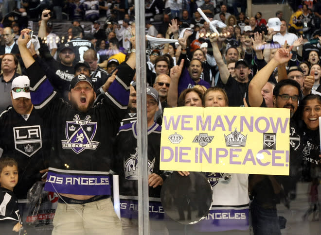 LOS ANGELES, CA - JUNE 11: Los Angeles Kings fans celebrate after Game Six of the 2012 Stanley Cup Final at Staples Center on June 11, 2012 in Los Angeles, California. The Kings defeated the Devils 6-1 in Game Six to win the series 4-2. (Photo by Christian Petersen/Getty Images)