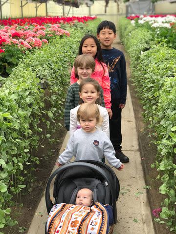 <p>Courtesy Emily Hackett-Fiske</p> "Ryan was one of those kids everyone liked," Emily says of her oldest child (with his siblings in 2018).