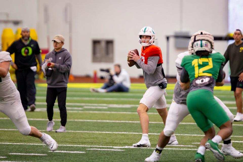 Oregon quarterback Bo Nix (10) looks to pass the ball during Practice with the Ducks Tuesday, April 19, 2022. 