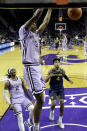 Kansas State's DaJuan Gordon dunks the ball during the second half of an NCAA college basketball game against West Virginia Saturday, Jan. 18, 2020 in Lawrence, Kan. Kansas State won 84-68. (AP Photo/Charlie Riedel)