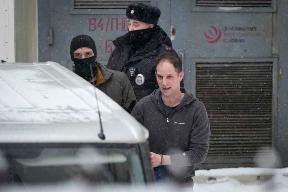 Wall Street Journal reporter Evan Gershkovich, right, is escorted from the Lefortovsky court in Moscow, Russia. (AP)