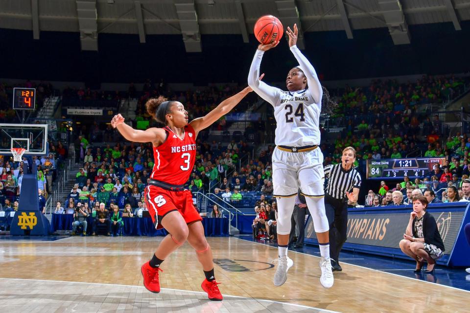 Feb 25, 2018; South Bend, IN, USA; Notre Dame Fighting Irish guard Arike Ogunbowale (24) shoots over North Carolina State Wolfpack guard Kai Crutchfield (3) in the second half at the Purcell Pavilion. Matt Cashore-USA TODAY Sports