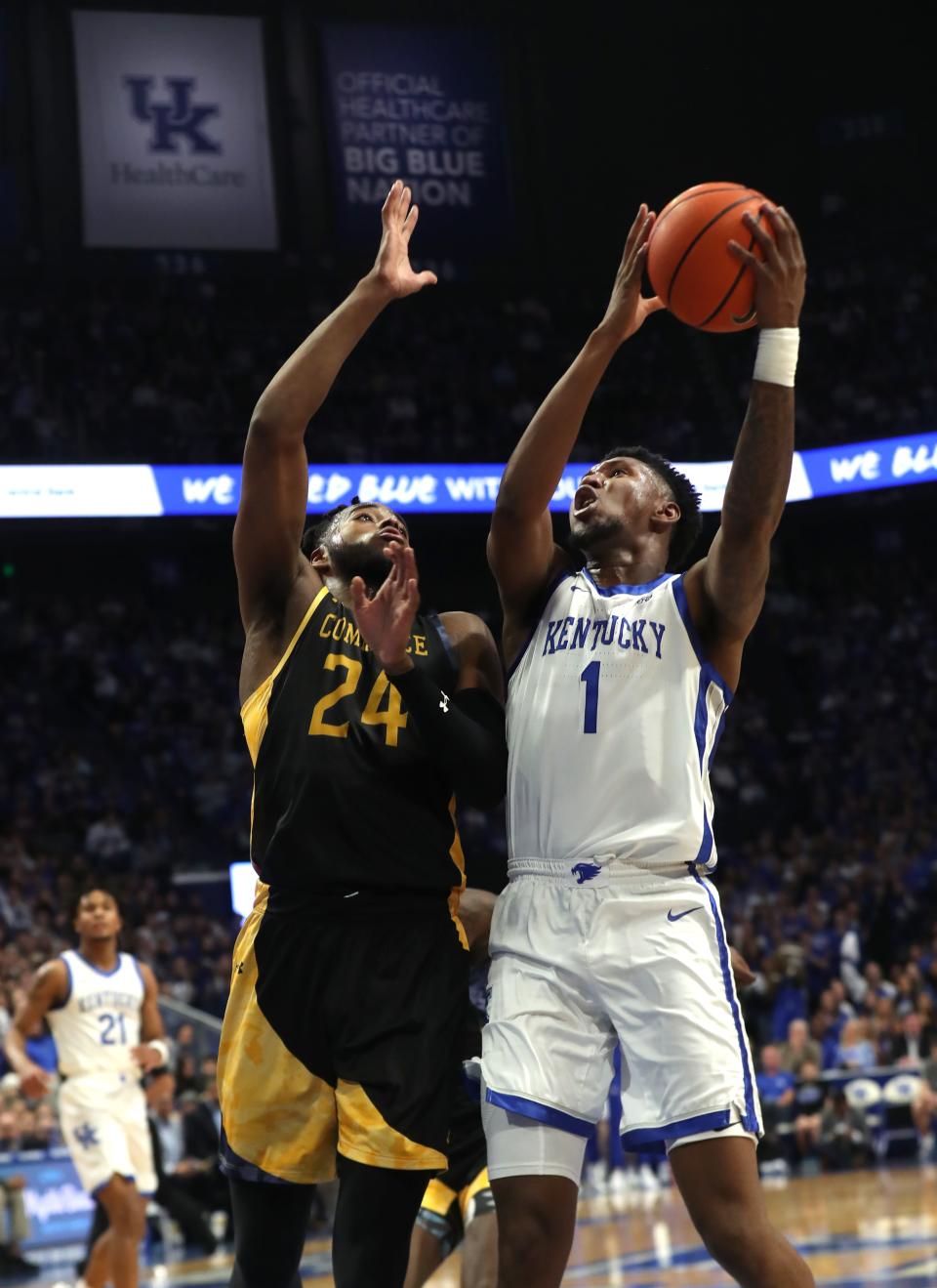 Kentucky’s Justin Edwards tries to make the bucket against Texas A&M-Commerce's Jerome Brewer Jr. on Friday night.