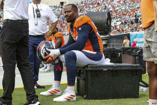 A dog wears the jersey of Denver Broncos outside linebacker Von Miller  before an NFL football game against the Tennessee Titans Sunday, Oct. 13,  2019, in Denver. (AP Photo/David Zalubowski Stock Photo 