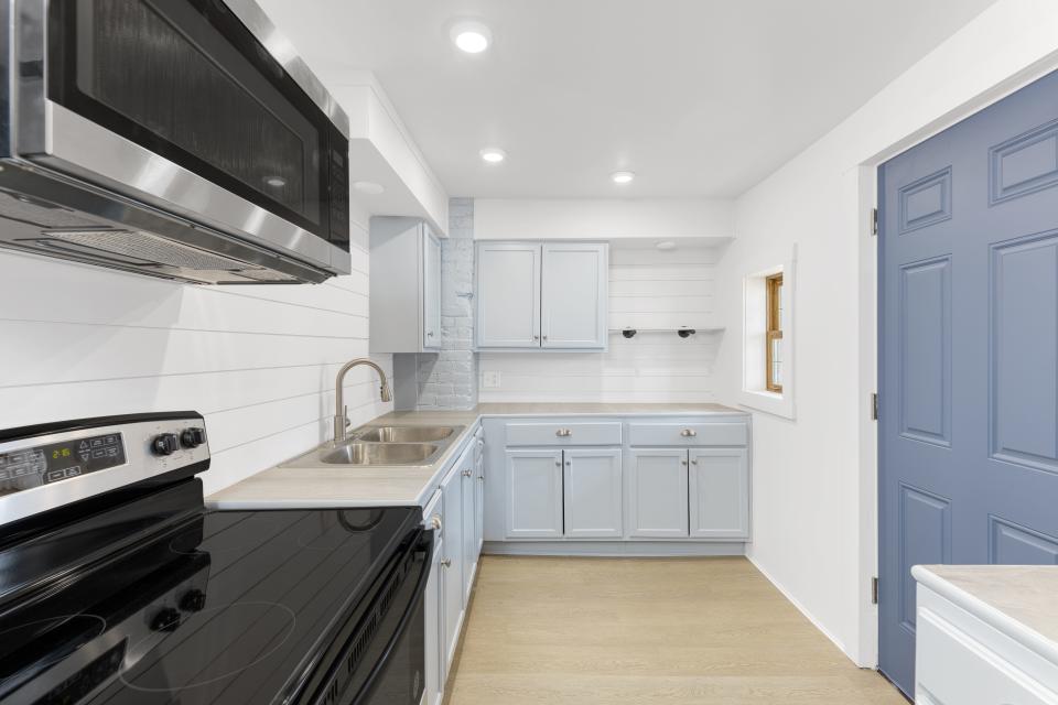 This photo shows the kitchen in the newly rehabbed home. On the market for $129,000, it is listed through Kurt Ragsdale with Carol Goff & Associates.