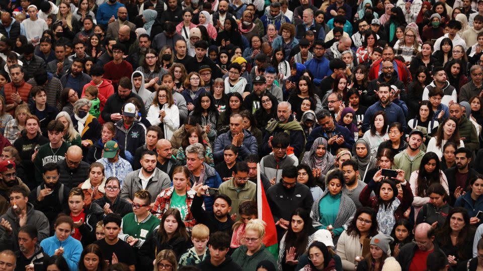 Community members attend a vigilfor Wadea Al-Fayoume at the Prairie Activity and Rec Center on Tuesday. - Scott Olson/Getty Images