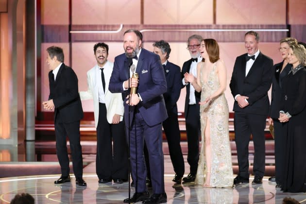 Willem Dafoe, Ramy Youssef, Yorgos Lanthimos, Mark Ruffalo, Tony McNamara, Emma Stone and Andrew Lowe accept the award for Best Motion Picture – Musical or Comedy for “Poor Things” at the 81st Golden Globe Awards held at the Beverly Hilton Hotel on January 7, 2024 in Beverly Hills, California. - Credit: Rich Polk/Golden Globes 2024