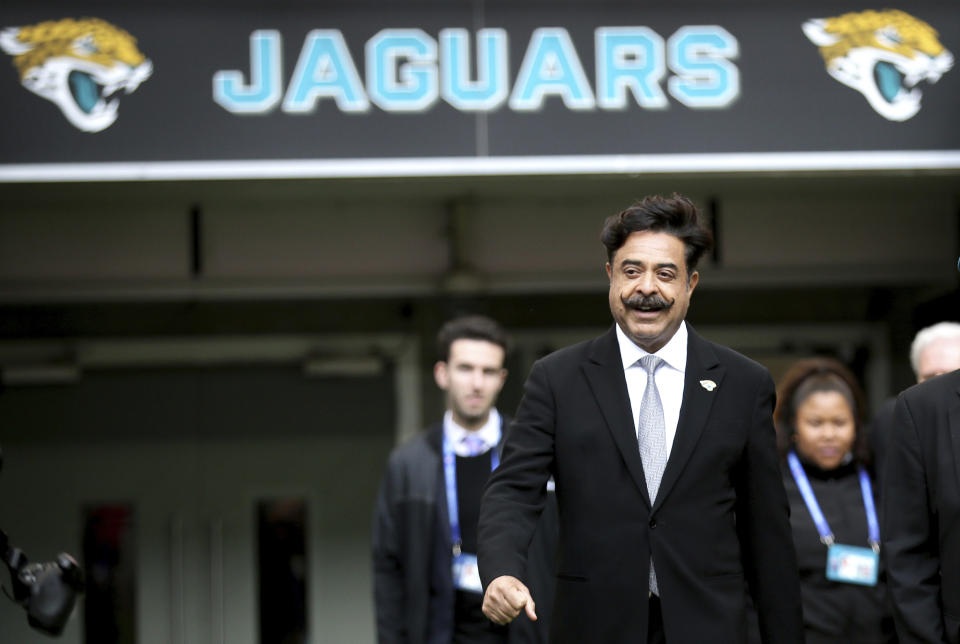 FILE - In this Oct. 28, 2018, file photo, Jacksonville Jaguars owner Shahid Khan arrives to watch the warm-up before an NFL football game against Philadelphia Eagles at Wembley stadium in London. Backed by billionaire Jacksonville Jaguars owner Shahid Khan and his son Tony, new promotion All Elite Wrestling is set to make its debut on Wednesday, Oct. 2, 2019, on TNT. The company wants to give WWE a run for its money and has already signed big stars Chris Jericho and Cody Rhodes to make an instant splash. (AP Photo/Tim Ireland, File)