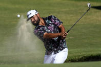 J.J. Spaun hits from the bunker on the 18th green during the second round of the Sony Open golf tournament, Friday, Jan. 13, 2023, at Waialae Country Club in Honolulu. (AP Photo/Matt York)