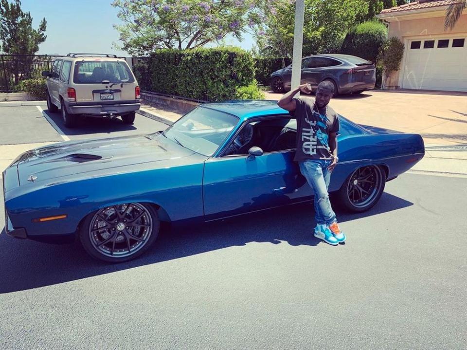 Kevin Hart with his classic Plymouth Barracuda, called 'Menace' (Credit: Instagram)