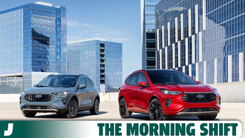 A photo of two Ford Escape SUVs parked next to each other. 