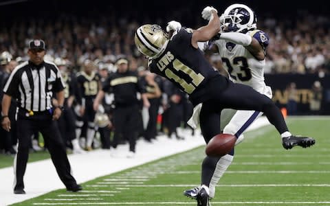 New Orleans Saints wide receiver Tommylee Lewis (11) works for a coach against Los Angeles Rams defensive back Nickell Robey-Coleman (23) during the second half the NFL football NFC championship game Sunday, Jan. 20, 2019, in New Orleans. The Rams won 26-23 - Credit: AP