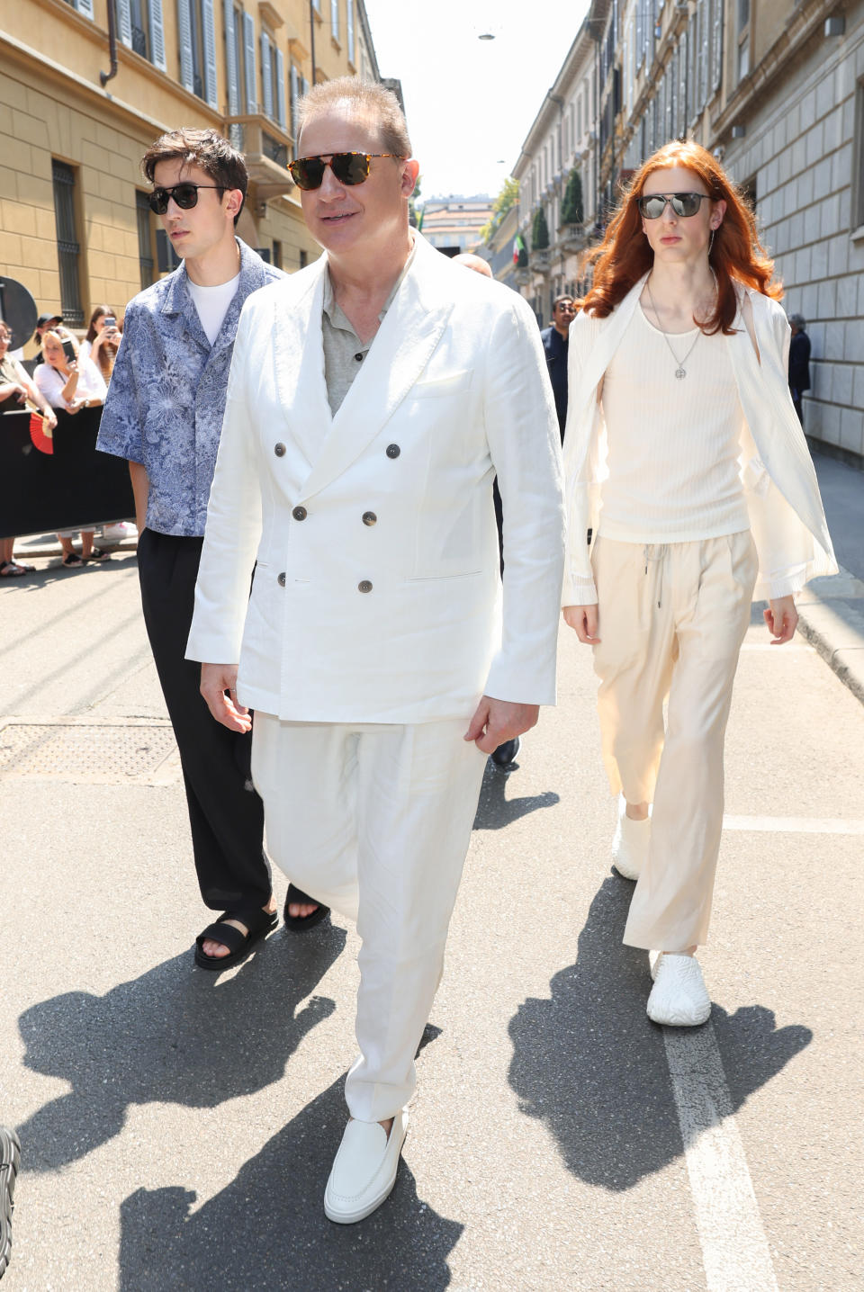 MILAN, ITALY - JUNE 19:  Brendan Fraser with his sons Holden Fraser (L) and Leland Fraser (R) are seen departing the Giorgio Armani Spring/Summer 2024 fashion show during the Milan Fashion Week menswear spring/summer 2024 on June 19, 2023 in Milan, Italy. (Photo by Jacopo Raule/Getty Images)