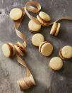 <p>Dulce de leche is like caramel made from sweetened milk, so it's pretty much perfect on its own. Sandwich it between two buttery cookies and presto, you won the cookie swap.</p><p>Get the <a href="https://www.goodhousekeeping.com/food-recipes/dessert/a35757/dulce-de-leche-sandwiches/" rel="nofollow noopener" target="_blank" data-ylk="slk:Dulce de Leche Sandwich Cookies recipe;elm:context_link;itc:0;sec:content-canvas" class="link "><strong>Dulce de Leche Sandwich Cookies recipe</strong></a>.</p>