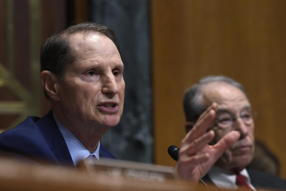 Senate Finance Committee ranking member Sen. Ron Wyden, D-Ore., left, sitting next to Committee Chairman Sen. Chuck Grassley, R-Iowa, right, speaks during a hearing on Capitol Hill in Washington, Tuesday, April 9, 2019, with pharmacy benefit managers that explored the high cost of prescription drugs. (AP Photo/Susan Walsh)