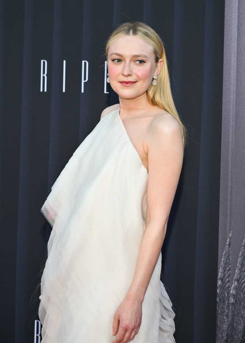 white fendi one-shoulder dress, Dakota Fanning at the premiere of Netflix's "Ripley" on April 3 in Los Angeles, Fendi, celebrity style, premiere, red carpet