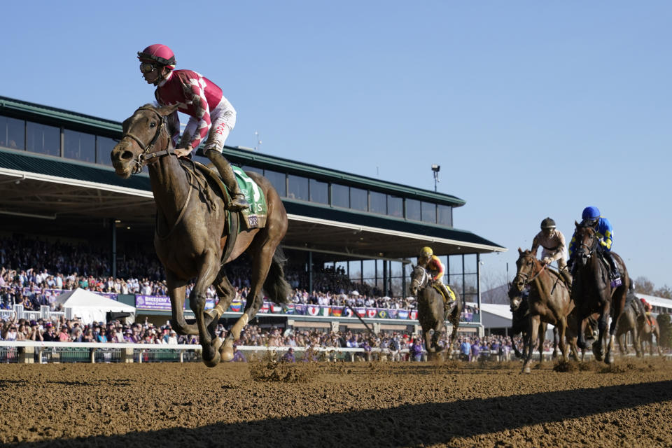 Tyler Gaffalione rides Wonder Wheel (5) to victory in the Breeders' Cup Juvenile Fillies race at the Keenelend Race Course, Friday, Nov. 4, 2022, in Lexington, Ky. (AP Photo/Jeff Roberson)