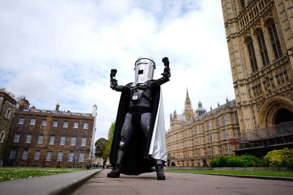 Count Binface poses outside Parliament in London (Aaron Chown/PA) (PA Wire)