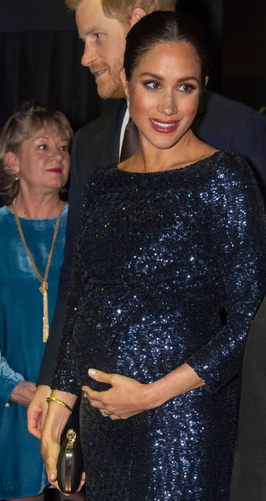 Meghan 'faking' a smile at royal event