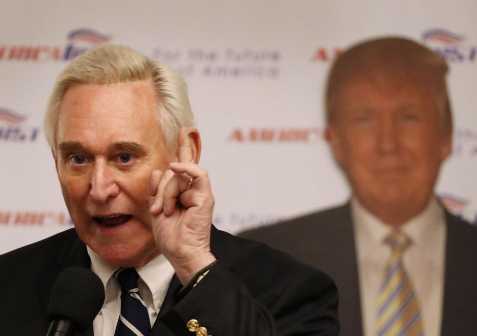 Roger Stone with a cardboard cutout of Donald Trump