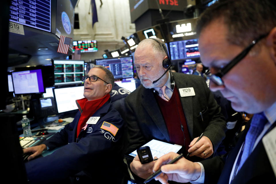 Traders work on the floor of the New York Stock Exchange shortly after the opening bell in New York City, U.S., November 21, 2019.  REUTERS/Lucas Jackson