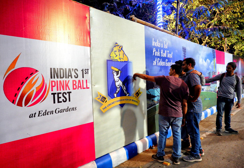 EDEN GARDEN, KOLKATA, WEST BENGAL, INDIA - 2019/11/21: Cricket Fan's taking selfie in front of the stadium. Kolkata is celebrating the glory of organising the 1st Pink Ball Test Cricket Match in India and within Asia between India and Bangladesh from 22 -26 November, 2019 at Eden Garden Stadium. (Photo by Avishek Das/SOPA Images/LightRocket via Getty Images)