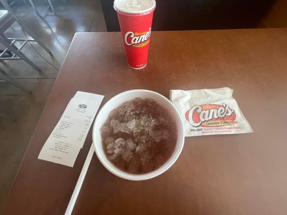 Bird's-eye-view of sweet tea with ice on a table at Raising Cane's