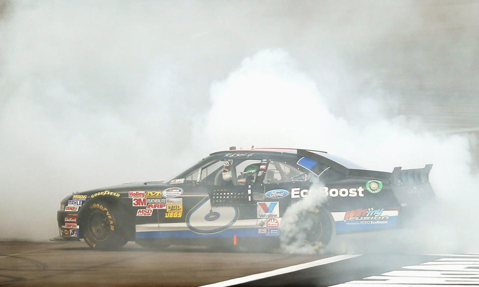 LAS VEGAS, NV - MARCH 10: Ricky Stenhouse Jr., driver of the #6 Ford EcoBoost Ford, does a burnout after winning the NASCAR Nationwide Series Sam's Town 300 at Las Vegas Motor Speedway on March 10, 2012 in Las Vegas, Nevada. (Photo by Ezra Shaw/Getty Images)