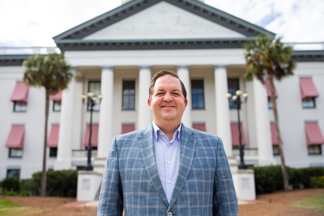 Republican Party of Florida Chairman Evan Powers poses for a portrait in front of the Historic Florida Capitol building on Thursday, Feb. 8, 2024.