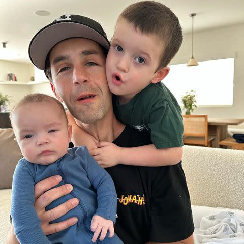 <p>Josh Peck Instagram</p> Josh Peck with his kids Max and Shai in January 2023.