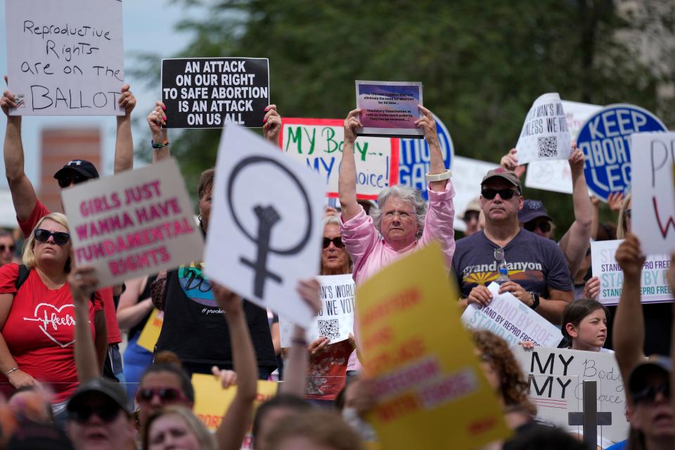 Abortion-rights activists rally at the Indiana Statehouse on June 25, 2022.