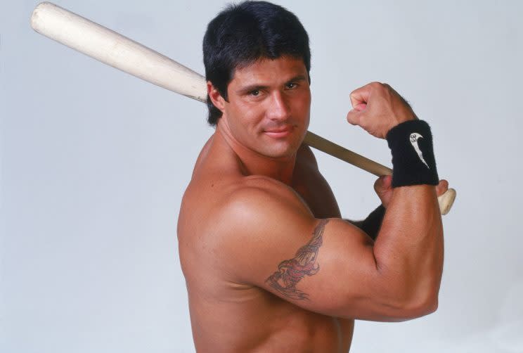 Jose Canseco needed some prompting to sign autographs. (Getty Images/Michael Zagaris)