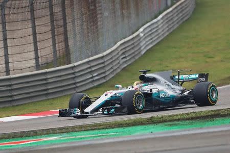 Formula One - F1 - Chinese Grand Prix - Shanghai, China - 09/04/17 - Mercedes driver Lewis Hamilton of Britain drives during the Chinese Grand Prix at the Shanghai International Circuit. REUTERS/Aly Song -