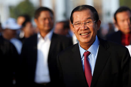 Cambodian Prime Minister Hun Sen arrives to attend the ceremony to mark the 39th anniversary of the toppling of Pol Pot's Khmer Rouge regime, in Phnom Penh, Cambodia, January 7, 2018. REUTERS/Samrang Pring