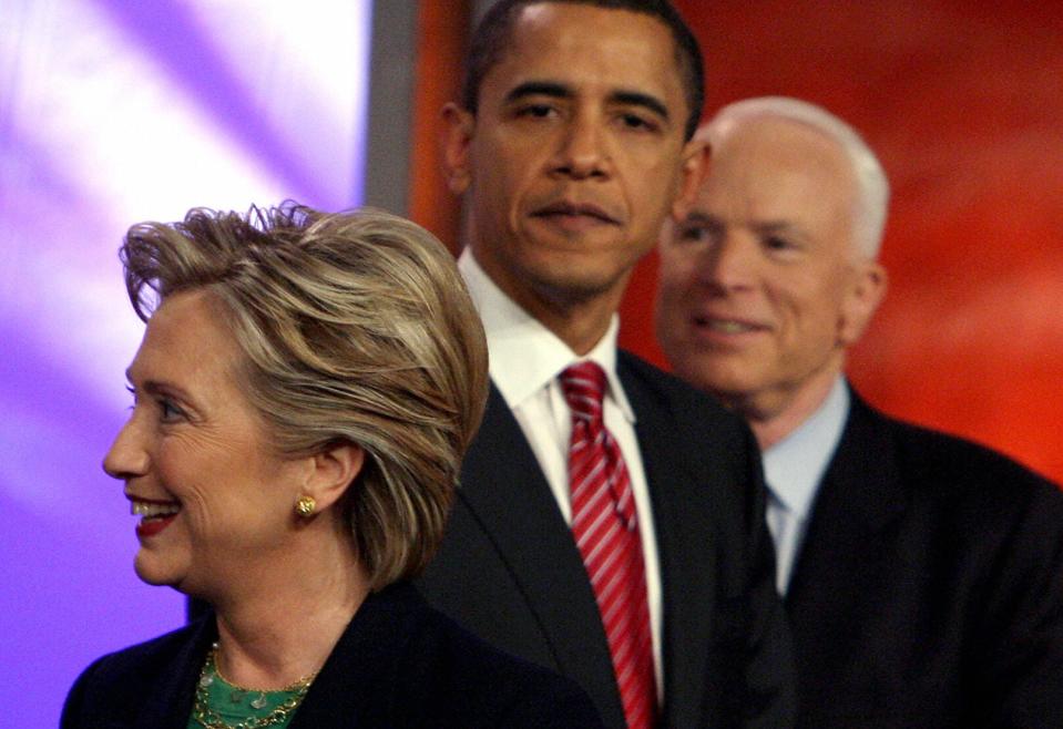 Hillary Clinton, Barack Obama, and John McCain briefly share the same stage during a 2008 presidential primary debate in New Hampshire.