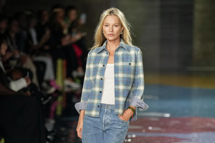 Kate Moss wears a creation as part of the Bottega Veneta women's Spring Summer 2023 collection presented in Milan, Italy, Saturday, Sept. 24, 2022. (AP Photo/Antonio Calanni)