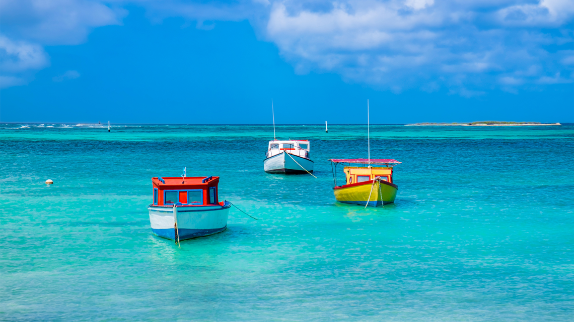 There is no shortage of bright sunshine and picturesque scenery in Aruba. American Airlines offers a direct flight from CLT to the island-nation’s Queen Beatrix International Airport.