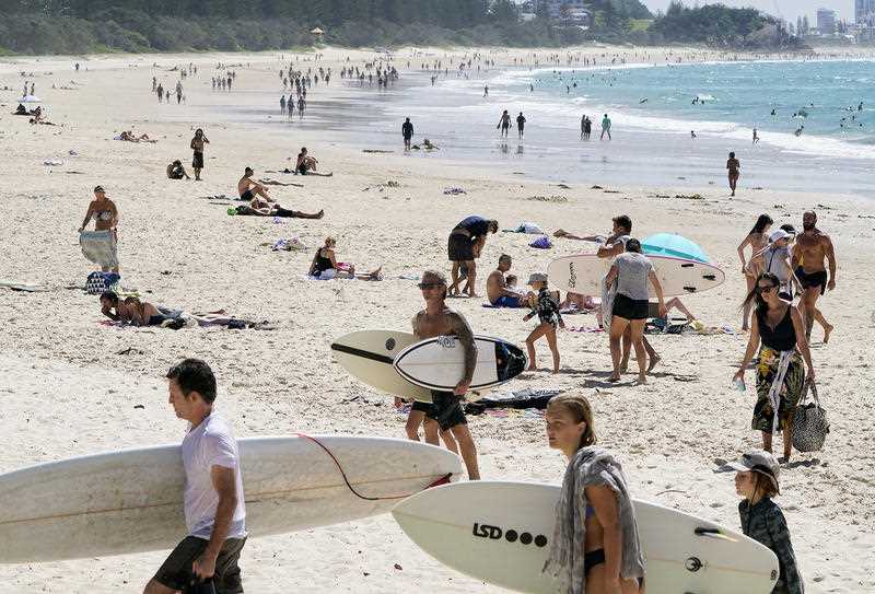 Crowds are seen at Burleigh Beach on the Gold Coast.