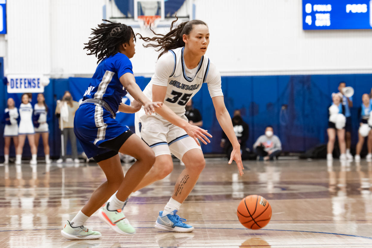 NEW YORK CITY, NY - MARCH 28: Columbia Lions guard Abbey Hsu (35) handles the ball while being defended by Seton Hall Pirates guard Lauren Park-Lane (3) during the first half of the WNIT Elite Eight basketball game between the Seton Hall Pirates and Columbia Lions on March 28, 2022 at Columbia University in New York, NY (Photo by John Jones/Icon Sportswire via Getty Images)