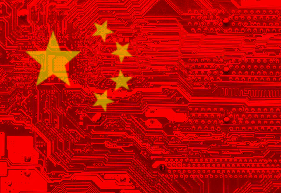 A Chinese flag superimposed on a circuit board.