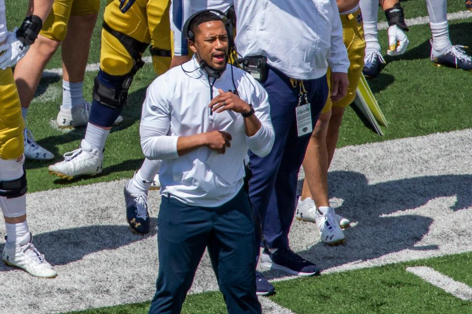 FILE - Notre Dame defensive coordinator Marcus Freeman is shown during the Blue-Gold NCAA spring football game in South Bend, Ind., in this Saturday, May 1, 2021, file photo. Marcus Freeman believes the best thing he can do as Notre Dameâ€™s new defensive coordinator is to get out of the way of his players. â€œThis is theirs. They built this. Iâ€™m the new guy,â€ said the 35-year-old Freeman, who seven months ago was picked by coach Brian Kelly to replace Clark Lea after Notre Dame finished 10-2 and ranked No. 5. (AP Photo/Robert Franklin, File)