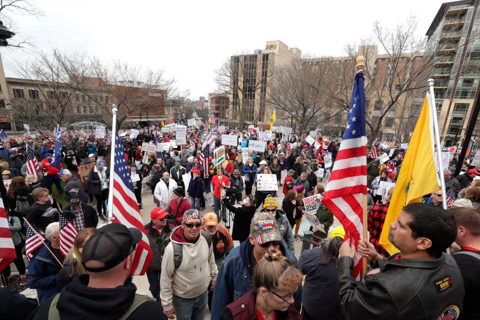 Protesters call for the state to reopen due to the economic damage they say it is causing and directed their anger toward Wisconsin Governor Tony Evers during a freedom rally at the state Capitol, Friday, April 24,2020.