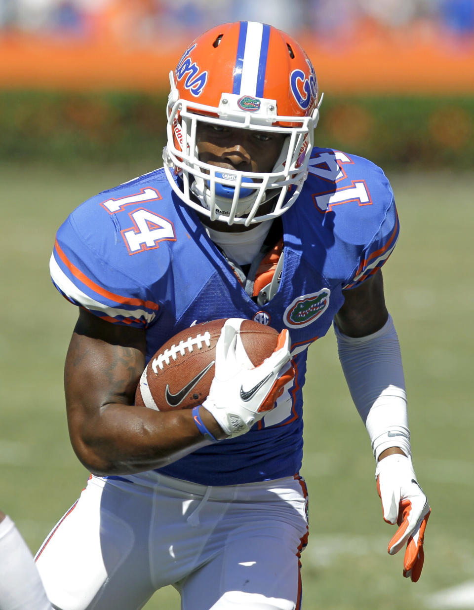 FILE - In hits Nov. 3, 2012, file photo, Florida defensive back Jaylen Watkins runs with the ball after intercepting a Missouri pass during the first half of an NCAA college football game in Gainesville, Fla. Clemson star receiver Sammy Watkins was the common thread early on the final day of the NFL draft Saturday. Watkins, the fourth overall selection in the first round by Buffalo, saw his older brother, Florida cornerback Jaylen Watkins, taken by Philadelphia to open the fourth round. (AP Photo/John Raoux, File)